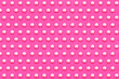 © gemma ferrando & jeremie roman/Westend61 - Pattern of white liquid drops against vibrant pink background