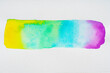 © Gemma Ferrando/Westend61 - Rainbow watercolor paint gradient brush stroke on white paper