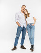 © Studio 27/Westend61 - Father standing with daughter against white background