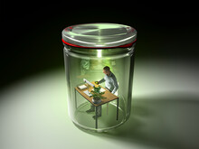 3D Rendering Of Man Working At Desk, Isolated In Preserving Jar