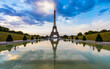 © henglein & steets/Westend61 - Eiffel Tower by Seine river against blue sky at sunset, Paris, France