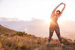 © Westend61 - Plus-Size-Model doing sports in the countryside at sunset