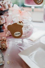 Candies In Jar With Bow On Party Table