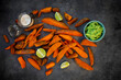 © Larissa Veronesi/Westend61 - Sweet potato wedges with avocado dip and fleur de sel