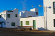 © Martin Siepmann/Westend61 - Spain, Canary Islands, Lanzarote, Caleta de Famara, boat in front of residential house