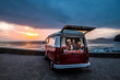 © Simona Pilolla/Westend61 - Senior couple traveling in a vintage van, lying in boot