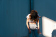 © Manu Prats/Westend61 - Female hip-hop dancer dancing against white wall during sunny day