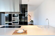 © Manu Prats/Westend61 - Kitchen island in modern house