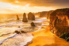 Scenic View Of Sea Against Cloudy Sky At Twelve Apostles Marine National Park During Sunset, Victoria, Australia