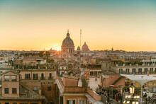 The Skyline Of Rome With San Carlo Al Corso And St. Peter's Basilica Before Sunset Seen From The Spanish Steps, Italy