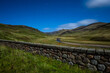© MARK JOHNSON/Westend61 - UK, Scotland, Glenshee, landscape with stone wall under starry sky