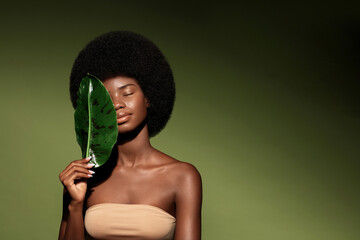 Wall Mural - natural organic cosmetics concept. beauty portrait of young beautiful african american woman with po