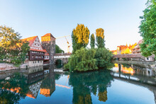 Germany, Nuremberg, Old Town, Henkersteg And Henkerhaus, Hangman's House With Pegnitz River In The Evening Light