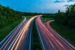 © Werner Dieterich/Westend61 - Germany, Baden-Wurttemberg, Blurred traffic lights on highway at dusk