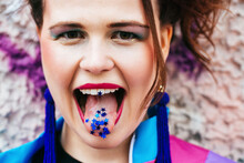 1980s Retro-styled Woman With Stars On Tongue