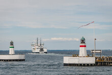 Denmark, Region Of Southern Denmark, Soby, Two Coastal Lighthouses With Ship Sailing Away In Background