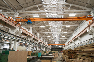 Wall Mural - Wood factory workshop, production wooden molds and steel machinery equipment, industrial interior.