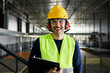 © Dangubic/Westend61 - Portrait of happy worker in factory warehouse