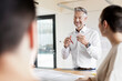 © Westend61 - Mature businessman leading a meeting in office