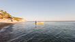 © Christos Markou/Wirestock - Yellow speed boat floating on the sea in Chios Island, Greece
