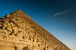 Photo of great Pyramid of Cheops from low angle near basis