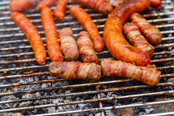 Poster - Closeup shot of barbecuing sausages