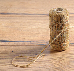 Poster - Jute rope on a wooden table