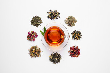 Poster - Composition with brewed tea, dry and fresh leaves on white background, top view