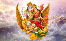 Lord Vishnu And Lakshmi Hindu God And Clouds Wallpaper