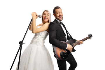 Poster - Cheerful bride and groom with a guitar and a microphone singing and smiling