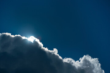 Wall Mural - .download preview.share.add to likebox.cloudscape with the sun shining through the clouds in a blue 