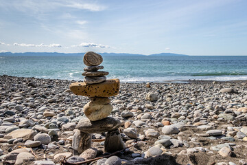 Wall Mural - Inukshuk on the beach on Vancouver Island, Canada