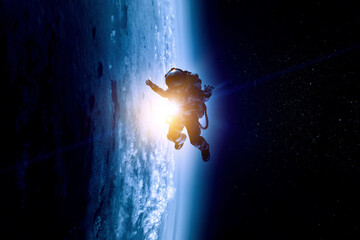 Canvas Print - astronaut at spacewalk . mixed media