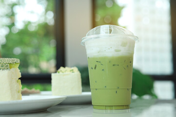 Iced matcha green tea in coffee cafe