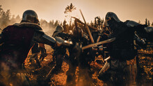 Epic Battlefield: Armies Of Medieval Knights Fighting With Swords. Brutal Action Battle Of Armored Warrior Soldiers. Dark Ages War, Warfare, Crusade. Cinematic Historical Reenactment.