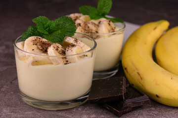 Banana pudding with chocolate sprinkles.
Close-up.
