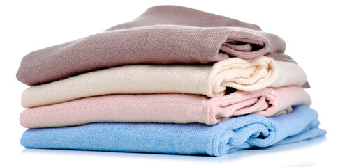 Poster - Stack folded sweaters on white background isolation