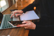 © chokniti - business worker person working at cafe by using laptop computer on online communication technology