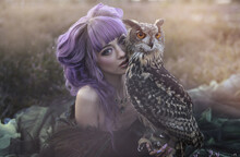 Beautiful Woman With Owl In The Nature