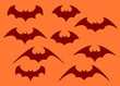 Halloween flying bat. Vampire vector bat. Dark silhouette of bat flying in a flat style