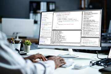 African American Web Coder At Computer. Software Programmer