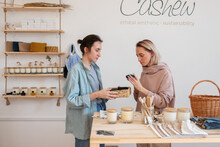 Women Choosing Organic Soap In Shop