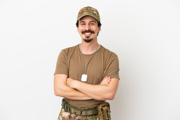 Canvas Print - Soldier man isolated on white background keeping the arms crossed in frontal position