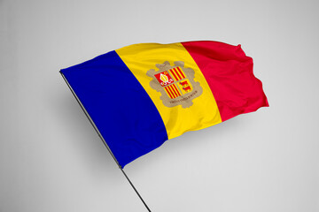Andorra flag isolated on white background. close up waving flag of Andorra. flag symbols of Andorra. Concept of Andorra.