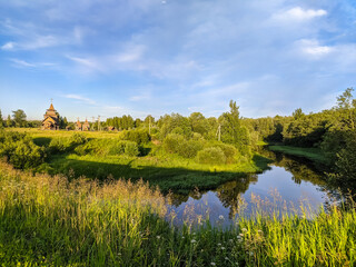 Wall Mural - Pavlovo, Saint-Petersburg, Russia. Beautiful wooden church in Saint-Petersburg suburbs.