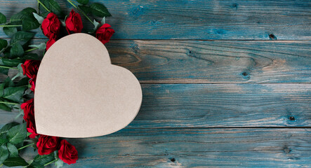 Sticker - Valentines day background with lovely red roses and heart shaped giftbox on faded blue wood