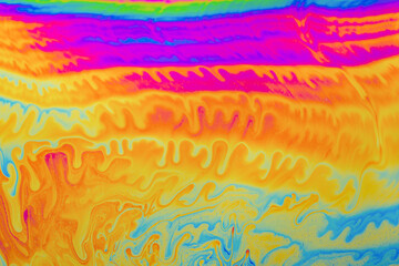 Wall Mural - Psychedelic multicolored background abstract. Rainbow colors. patterns background. Photo macro shot of soap bubbles