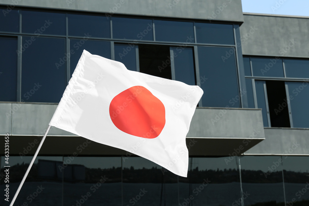 Waving flag of Japan outdoors