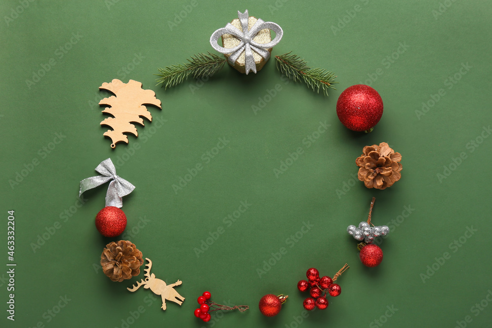 Frame made of beautiful Christmas decor on green background
