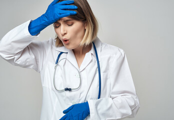 Wall Mural - female doctor in a white robe emotions treatment